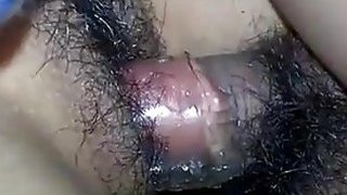 Nasty Indonesian chick takes big dick up her hairy snatch